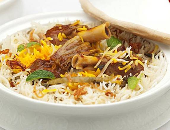 Order Goat Dum Biryani food online from Gumagumalu store, Fremont on bringmethat.com