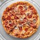 Order Meat Lovers Pizza food online from Georgianna's store, Braintree on bringmethat.com