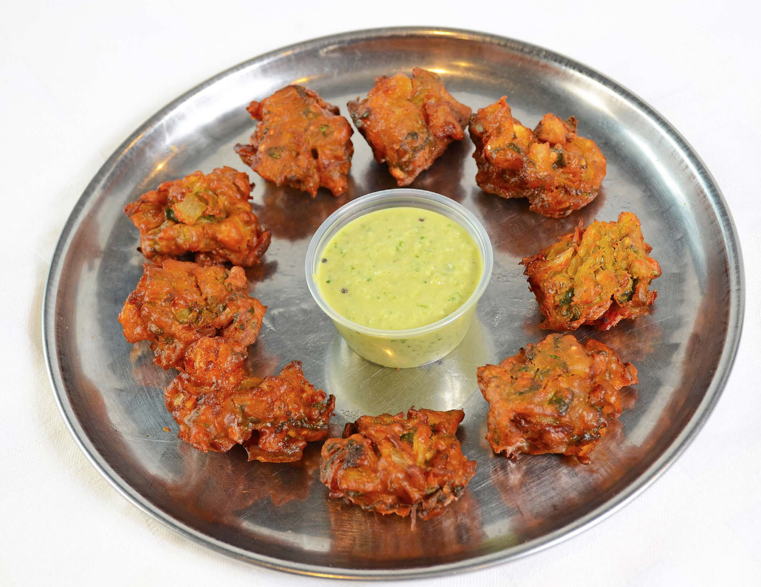 Order Onion Pakora (8-9 pc) food online from Shri Balaji Bhavan store, Houston on bringmethat.com