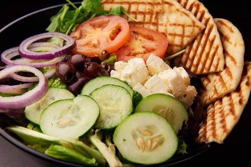Order Traditional Greek Salad food online from Mocha Bleu store, Teaneck on bringmethat.com