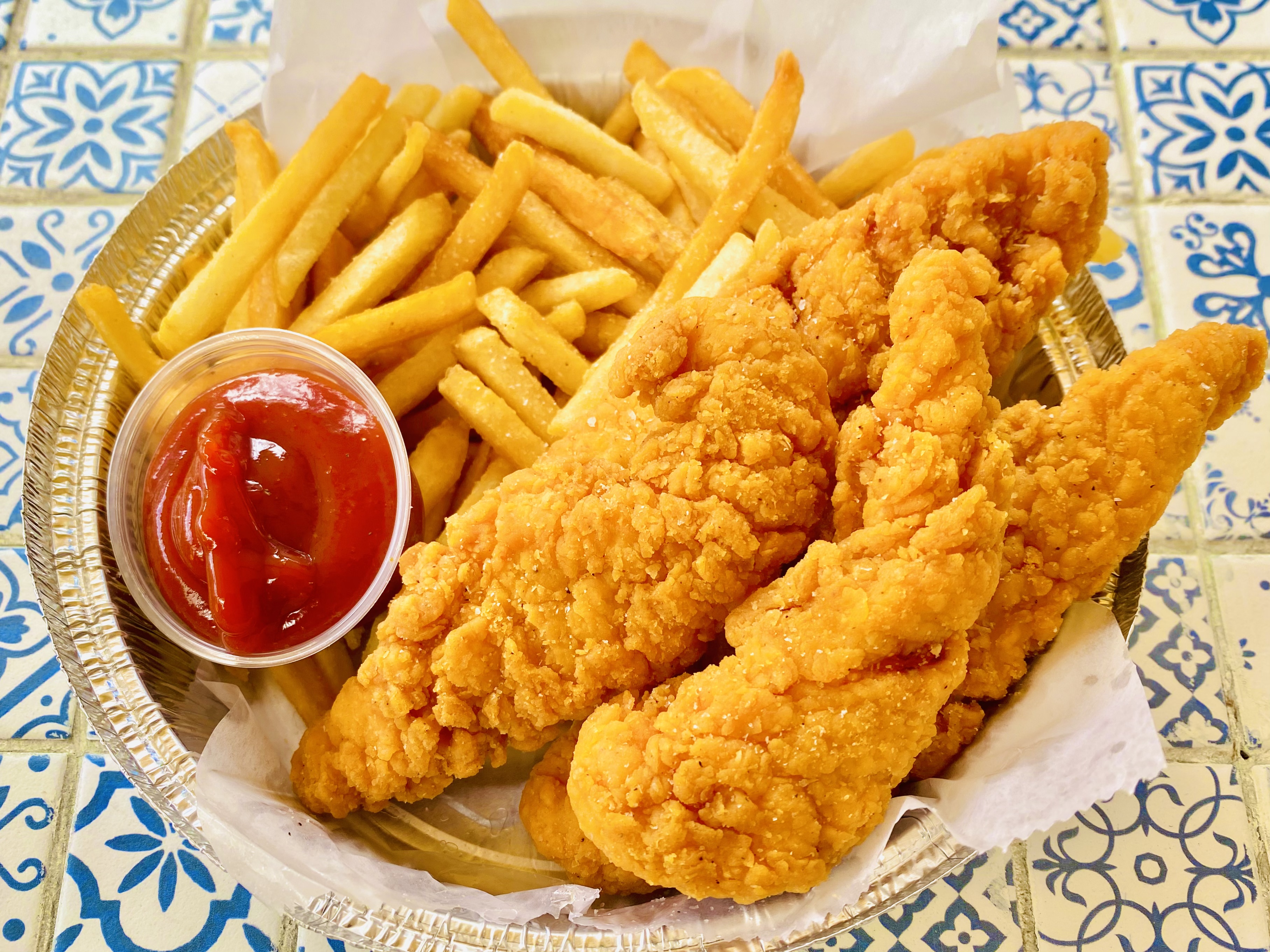 Order Chicken Tenders and French Fries  food online from La Cueva Fonda store, Bronx on bringmethat.com