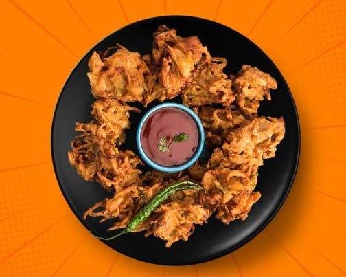 Order Golden Onion Pakoras  food online from Mad Over Curry store, Southlake on bringmethat.com