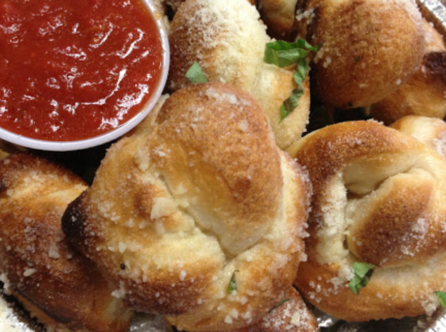 Order * Fresh Baked Garlic Bread Knots food online from La Befana store, Allston on bringmethat.com