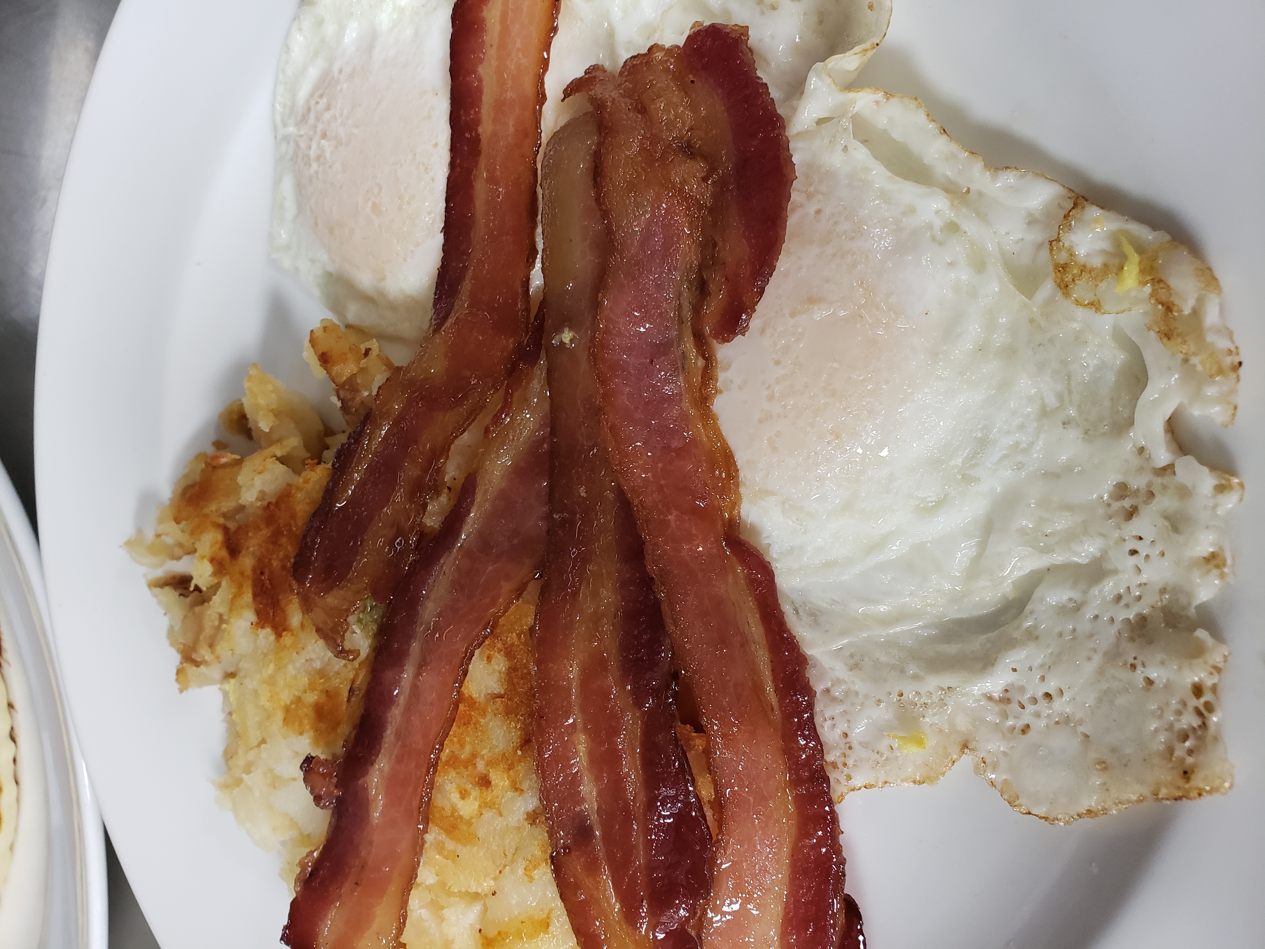 Order 2 Eggs and Meat food online from Pleasantville Diner store, Pleasantville on bringmethat.com