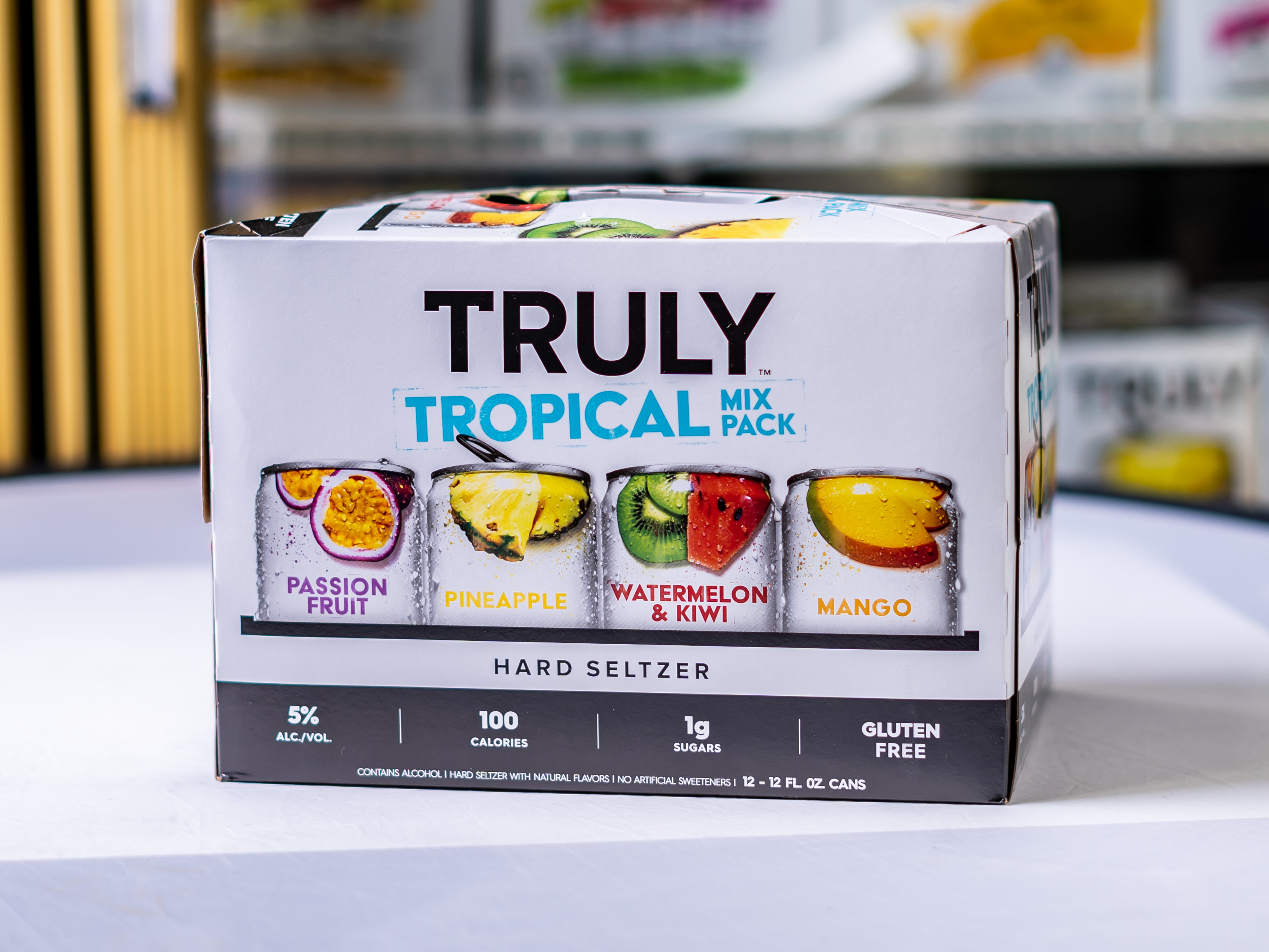 Order Truly - Tropical MIX 12 Pack food online from Beyer Market store, San Diego on bringmethat.com