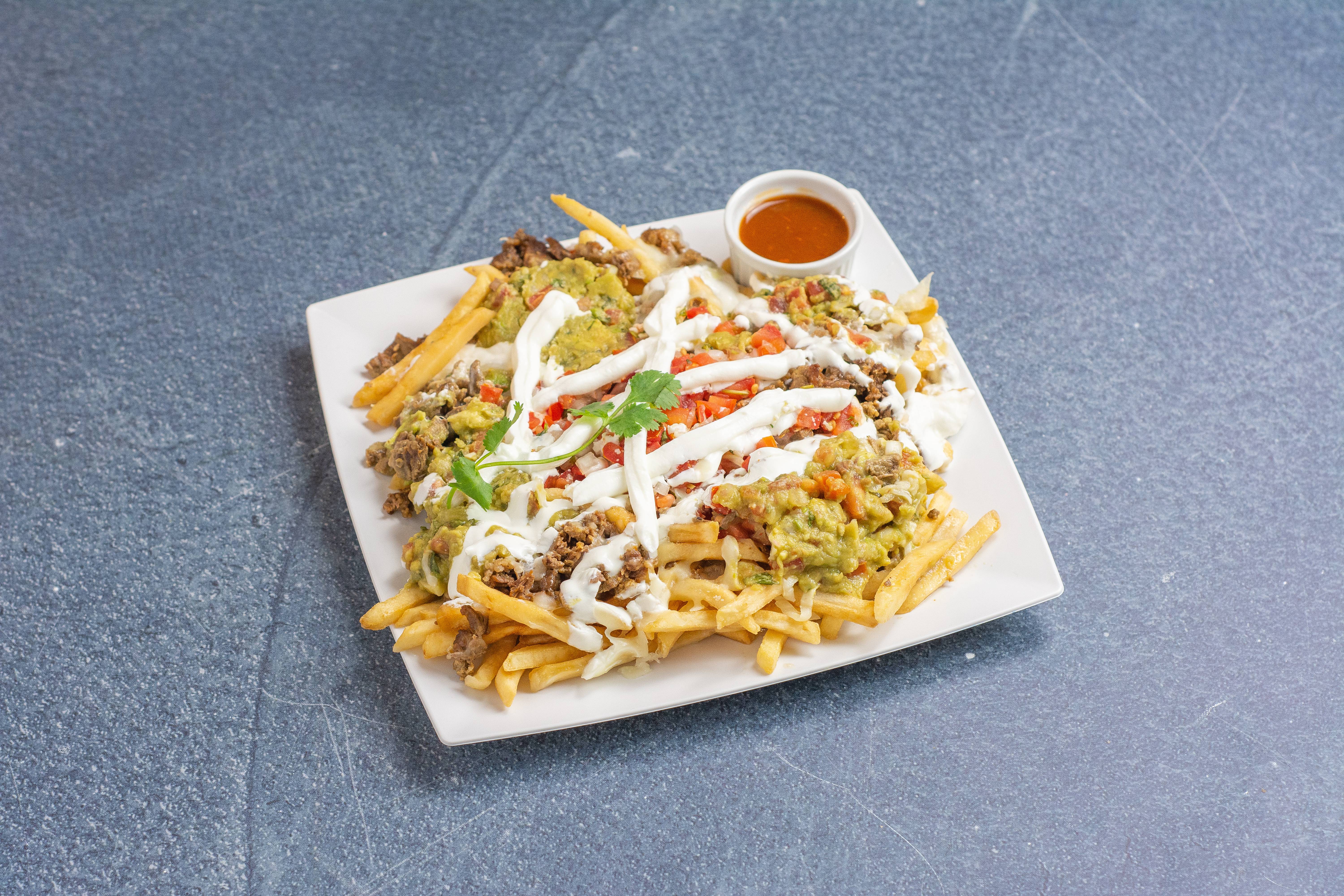 Order Carne Asada Fries food online from Arteagas Food Center store, Gilroy on bringmethat.com