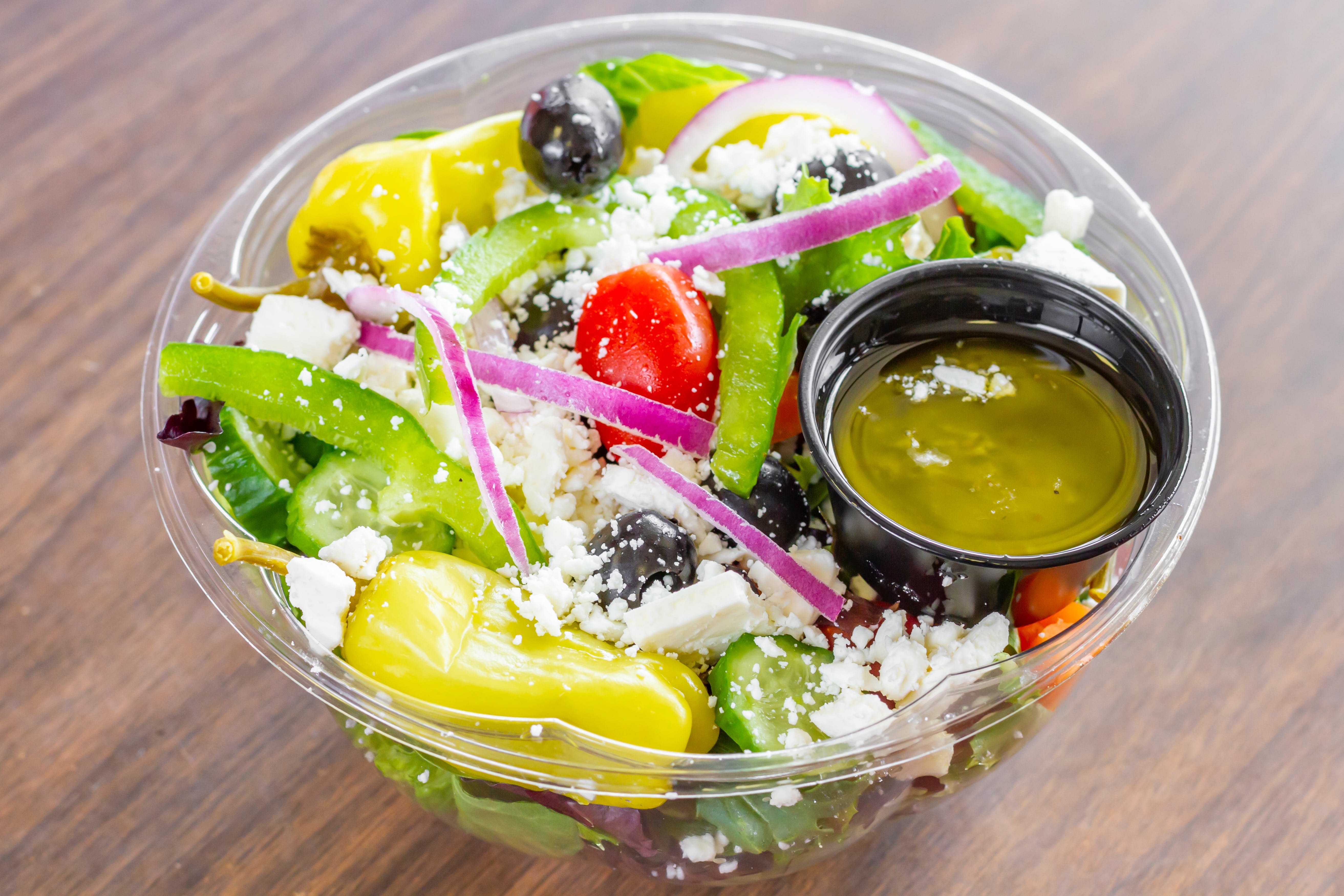 Order Greek Salad - Salad food online from Happy House Pizzeria store, Deale on bringmethat.com