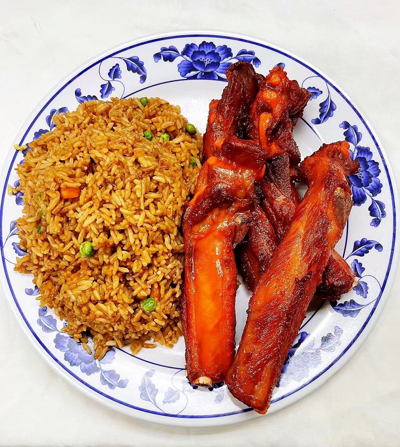 Order Barbecued spare Ribs (4)with Fried Rice food online from Hunan Diamond store, Columbia on bringmethat.com