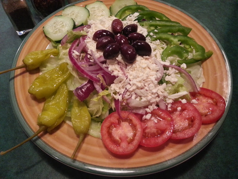 Order Greek Salad food online from Romios Pizza & Pasta store, Everett on bringmethat.com