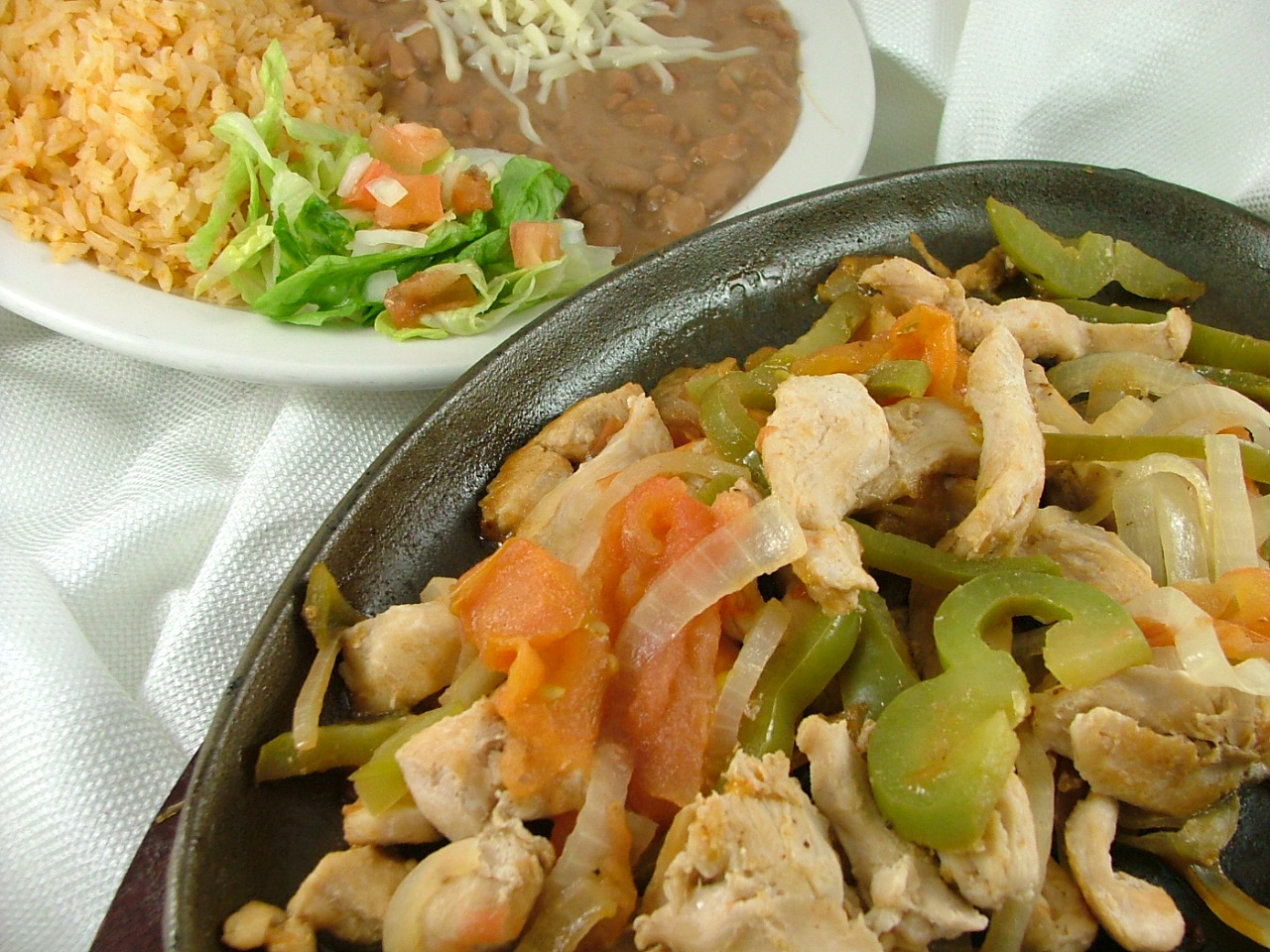 Order Fajitas de Pollo food online from El Pastor Mexican Restaurant store, Madison on bringmethat.com