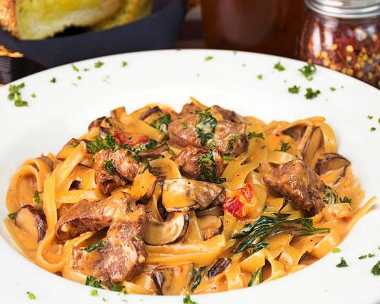 Order Fettuccine Paradiso food online from Eddie's Italian Eatery store, Claremont on bringmethat.com