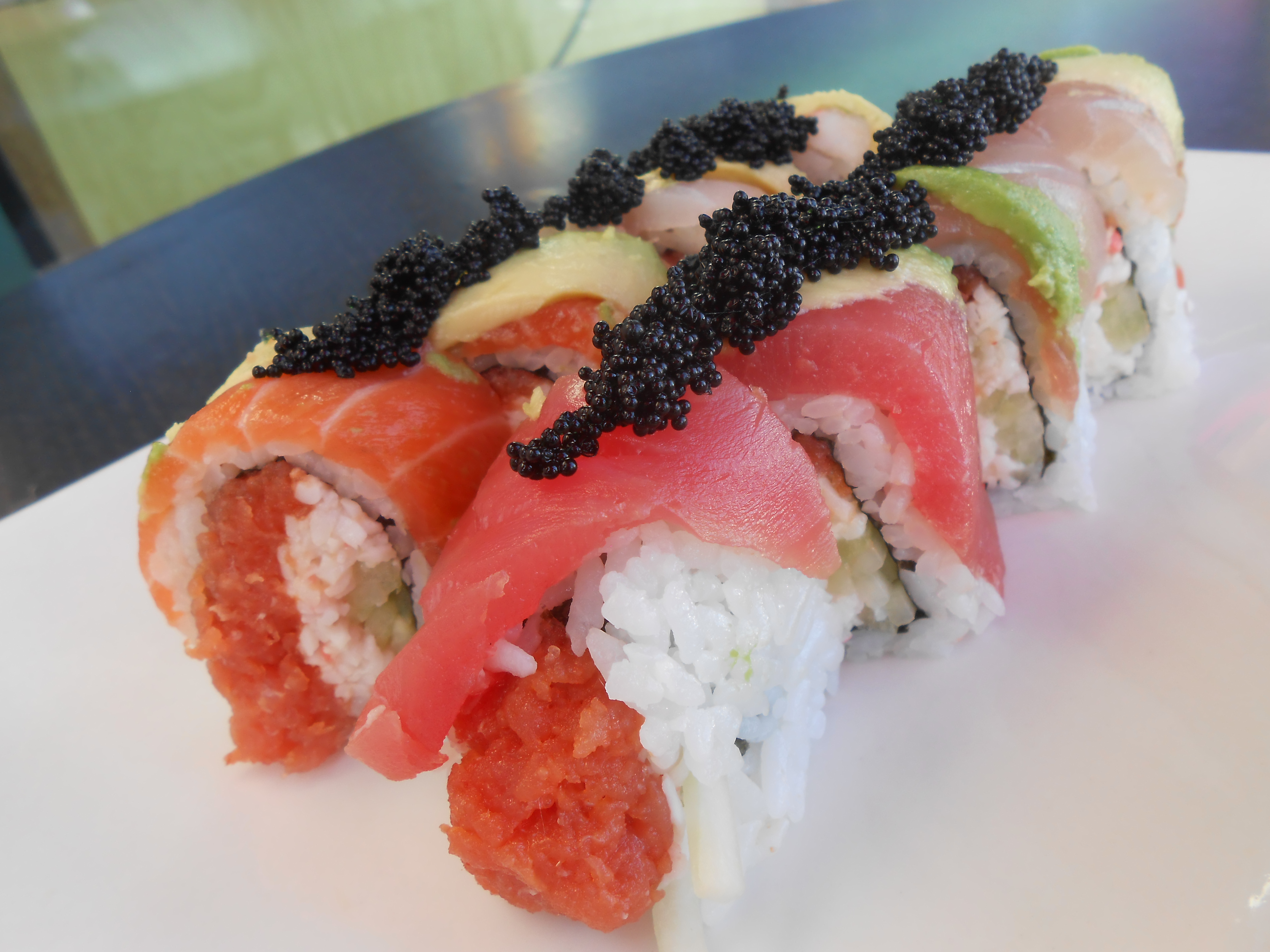 Order Deluxe Rainbow Sushi Roll food online from Gogo Japan store, Oceanside on bringmethat.com