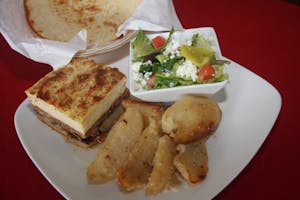 Order    Moussaka Dinner food online from Zorbas Fine Greek Cuisine store, Albuquerque on bringmethat.com