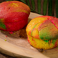 Order Slice of Rainbow Cake food online from Golden Krust store, Brooklyn on bringmethat.com