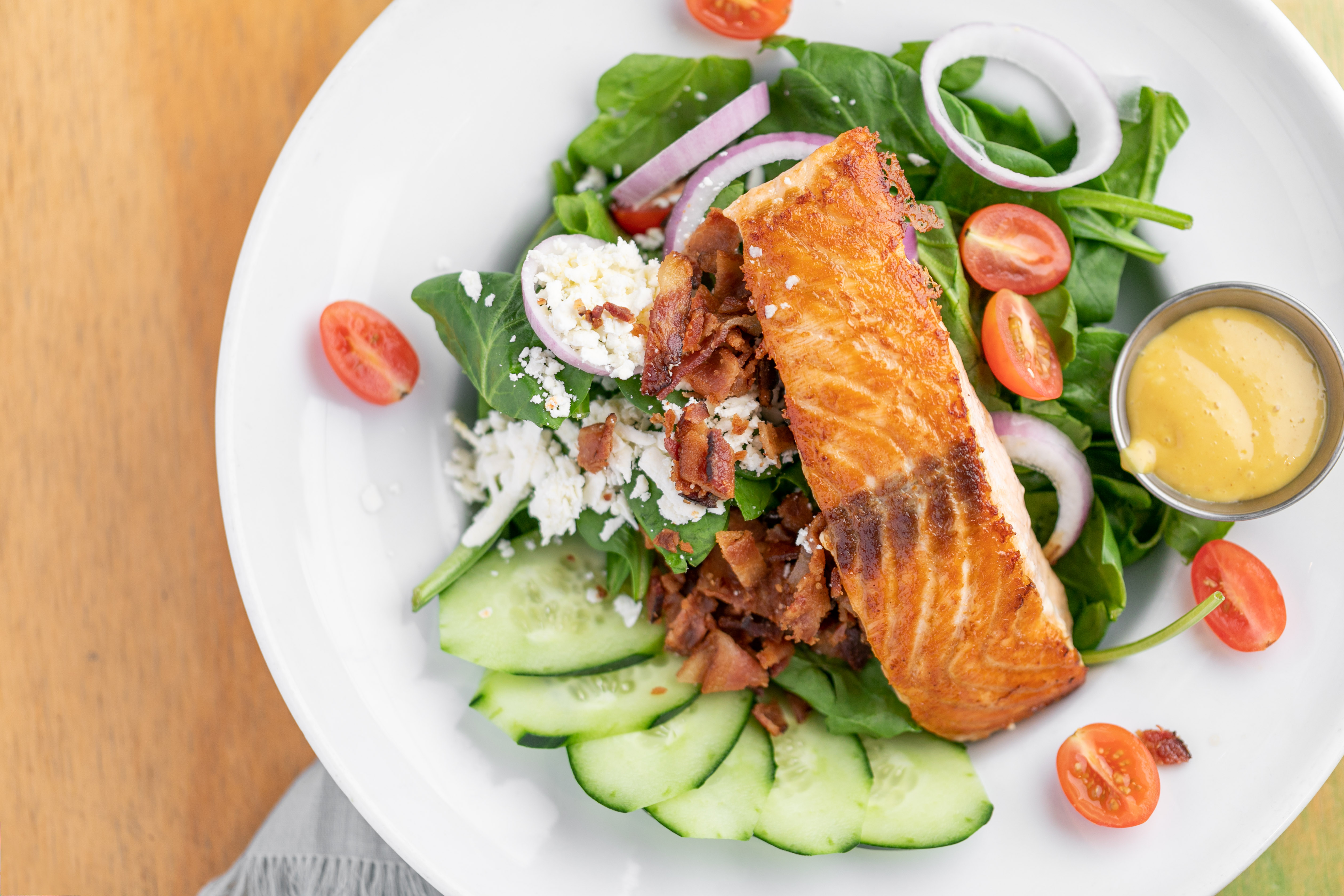 Order Tropical Salmon Salad food online from Swamis Cafe store, Solana Beach on bringmethat.com