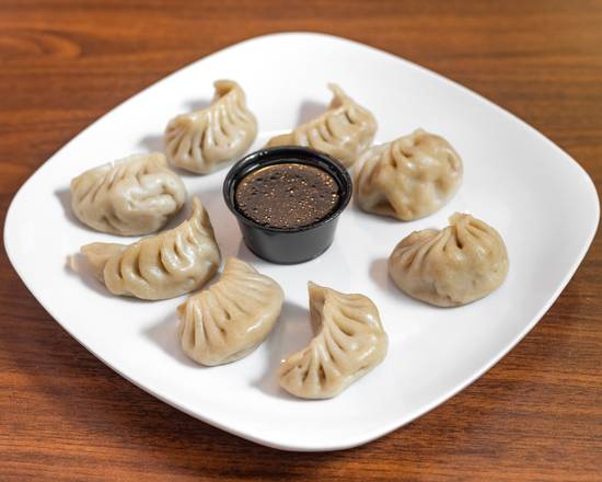 Order Fried or Steamed Dumplings (8 Pcs) food online from Chinatown Express store, Raleigh on bringmethat.com