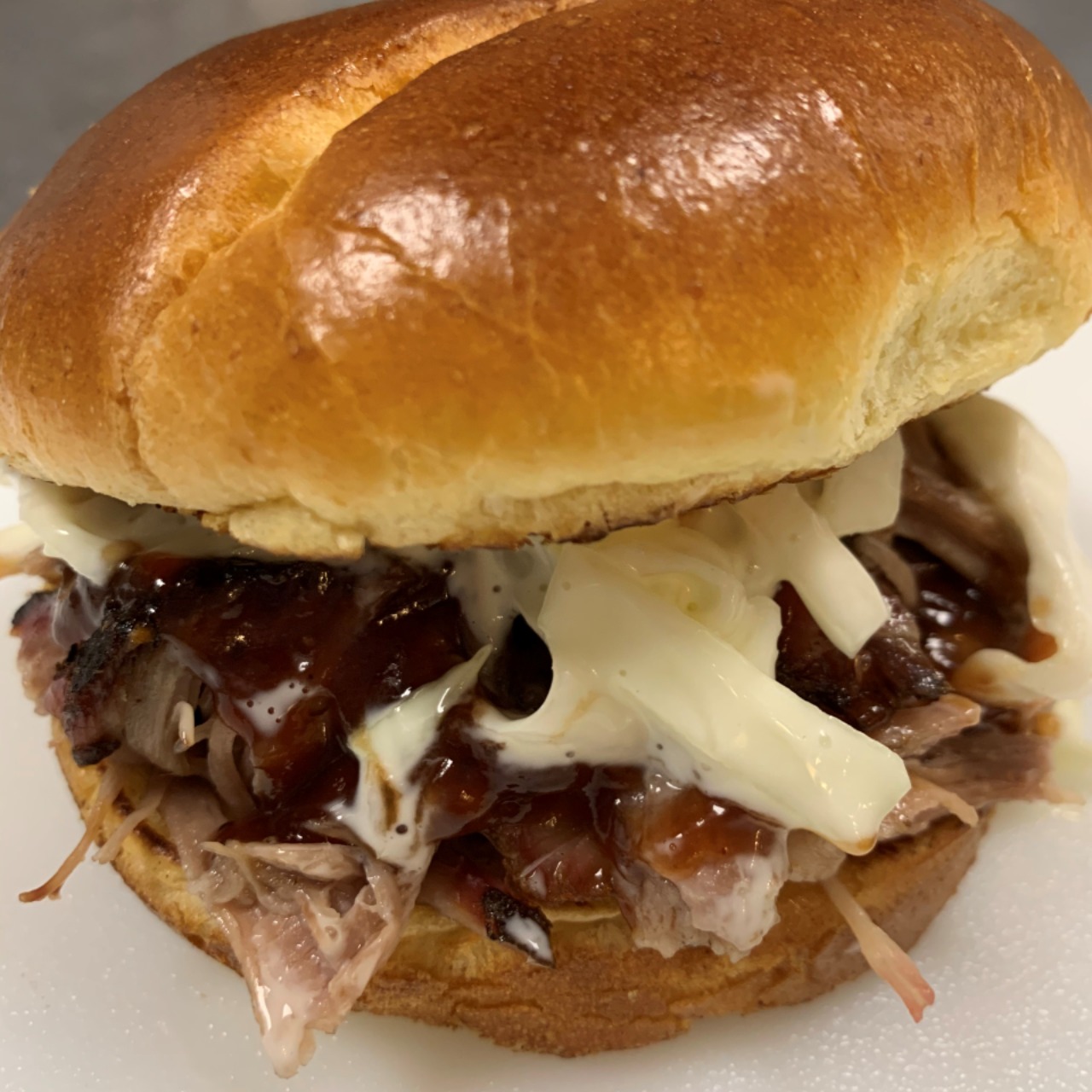 Order Pulled Pork Sandwich Topped w/Coleslaw food online from Heavenly Grub store, Columbus on bringmethat.com