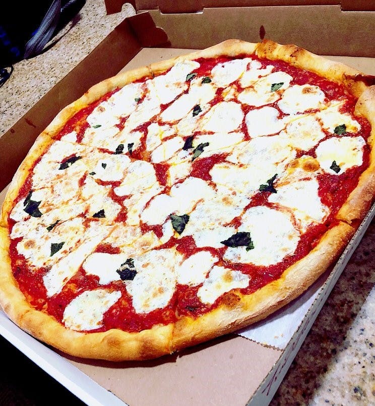Order Margarita Pizza Slice - Slice food online from La Famosa Pizza store, Holtsville on bringmethat.com