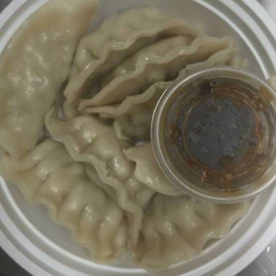 Order Steamed Dumpling (8) food online from China King store, St. Louis on bringmethat.com