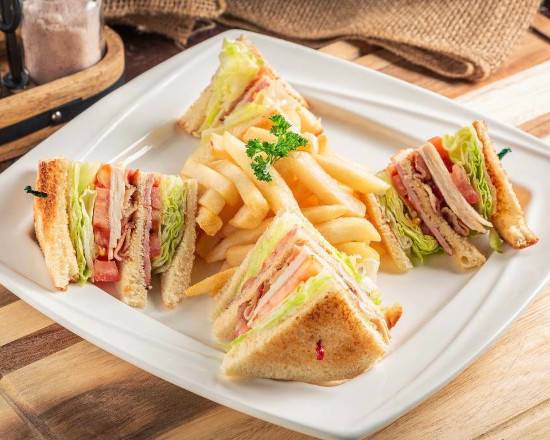 Order Club Sandwich w/ French Fries food online from Shooting Star Cafe store, Oakland on bringmethat.com