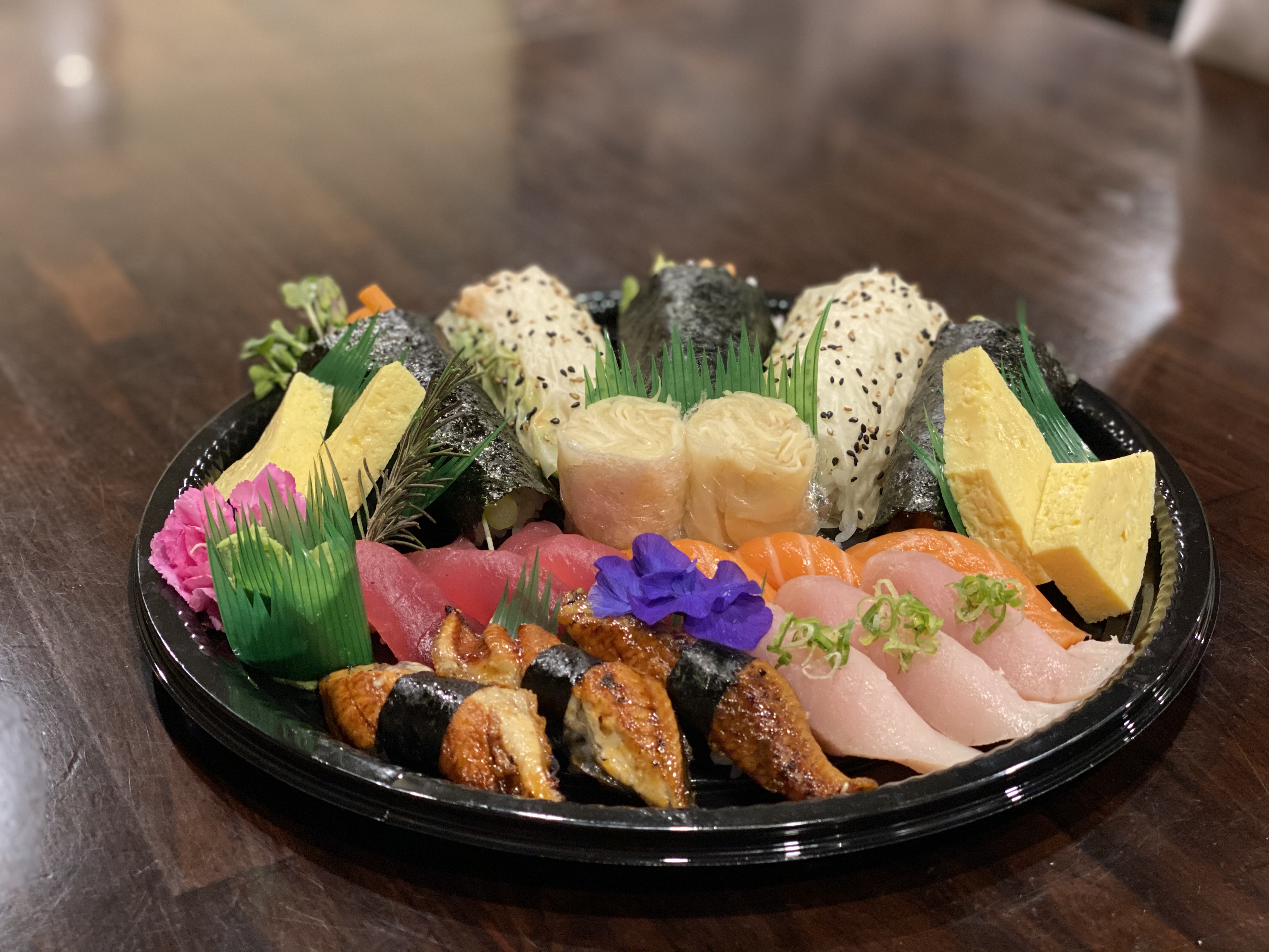 Order Sushi & Roll Family Plate food online from Kanpai Japanese Sushi Bar &amp; Gril store, Santa Monica on bringmethat.com
