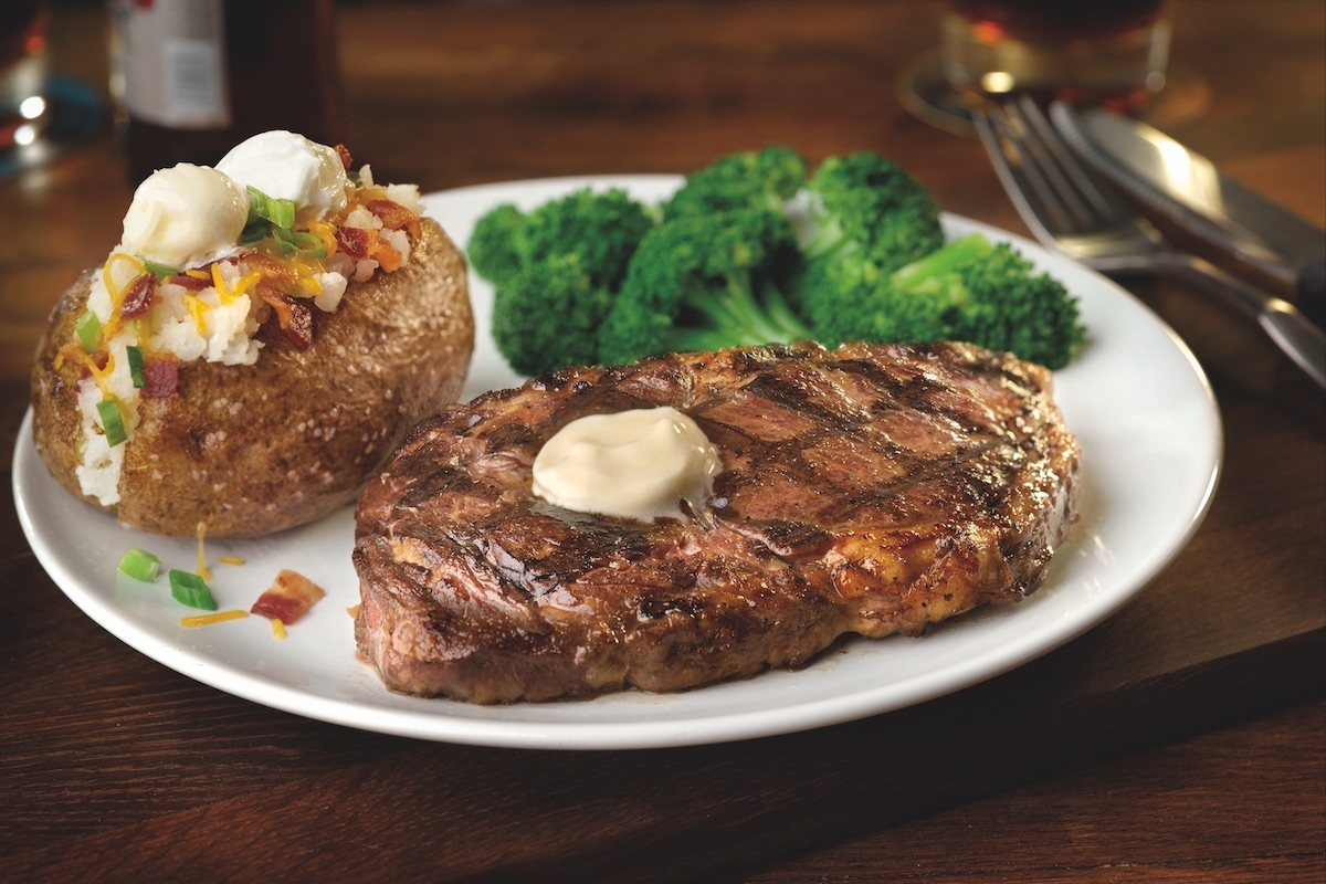 Order 14-oz Fire-grilled Ribeye food online from Smokey Bones Barbeque & Grill store, York on bringmethat.com
