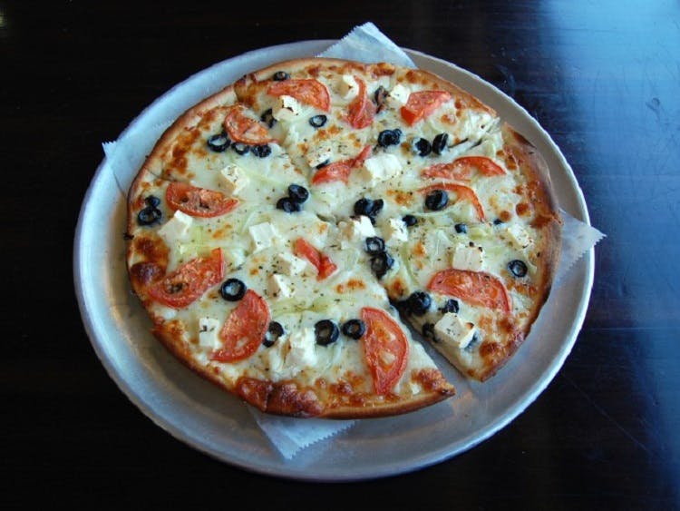 Order Greek Pizza - Medium 12'' food online from Claymont Steak Shop store, Claymont on bringmethat.com