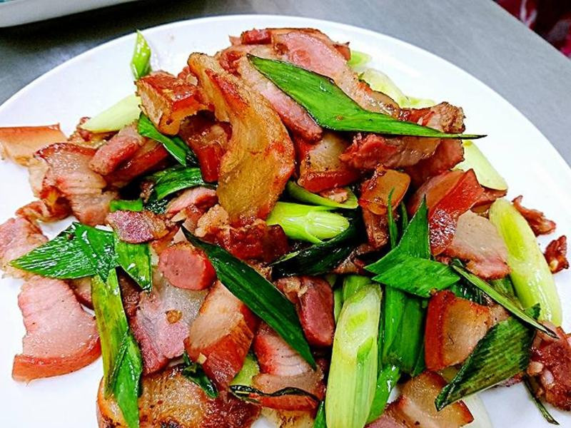 Order L2. Sauteed Preserved Pork w. Garlic Bolt 蒜苗臘肉 (午) food online from Szechuan Gourmet store, New York on bringmethat.com