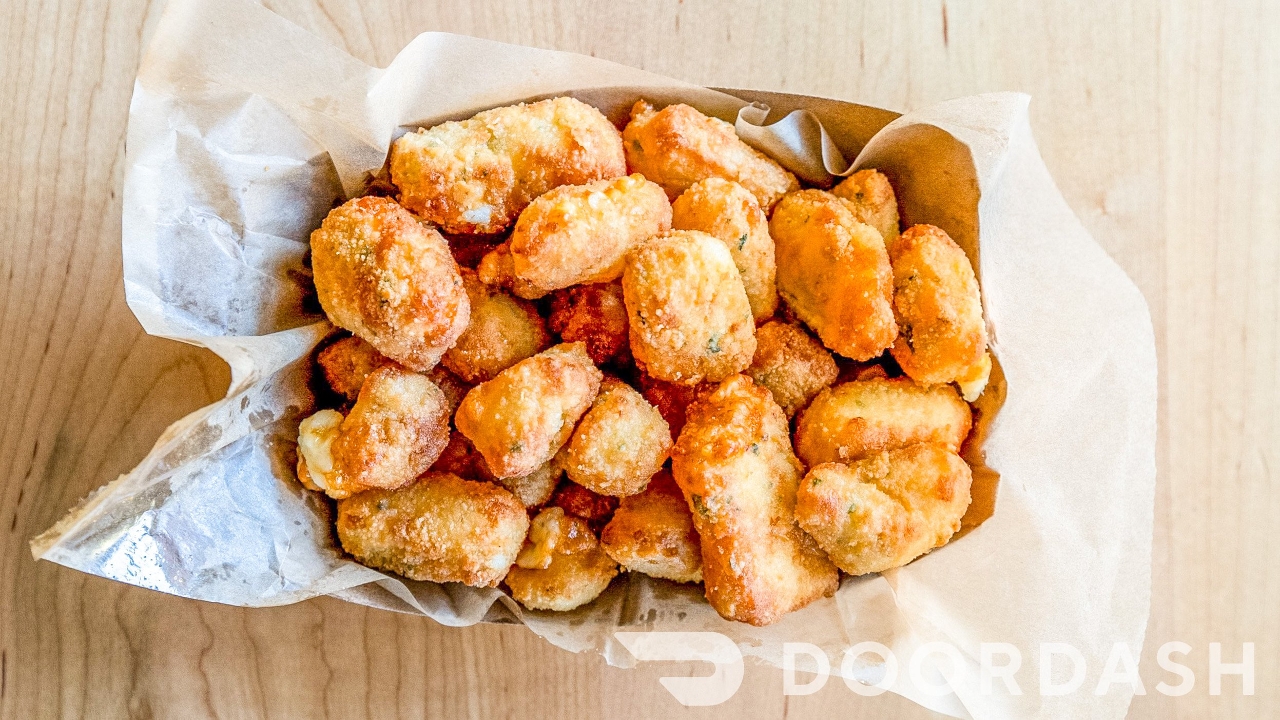 Order GARLIC CHEESE CURDS food online from The Monster Wings store, Concord on bringmethat.com