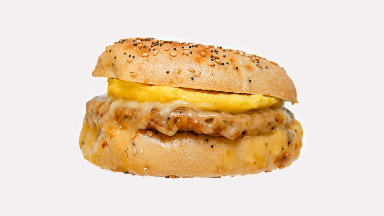 Order Sausage, Egg & Cheddar Cheese NY Style Everything Bagel food online from The Human Bean store, Hillsboro on bringmethat.com
