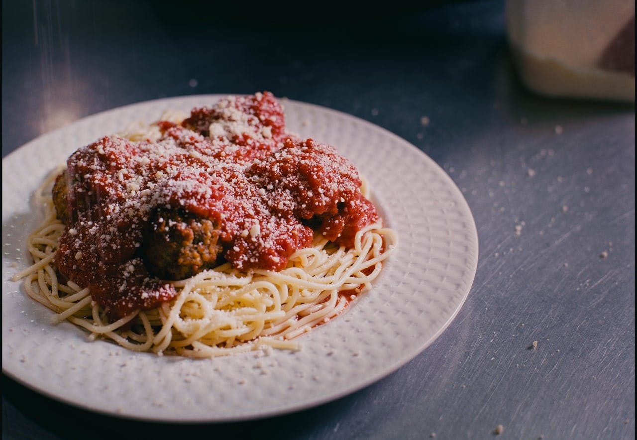 Order Spaghetti & Meatballs - Pasta food online from Troys Italian Kitchen store, Arlington on bringmethat.com