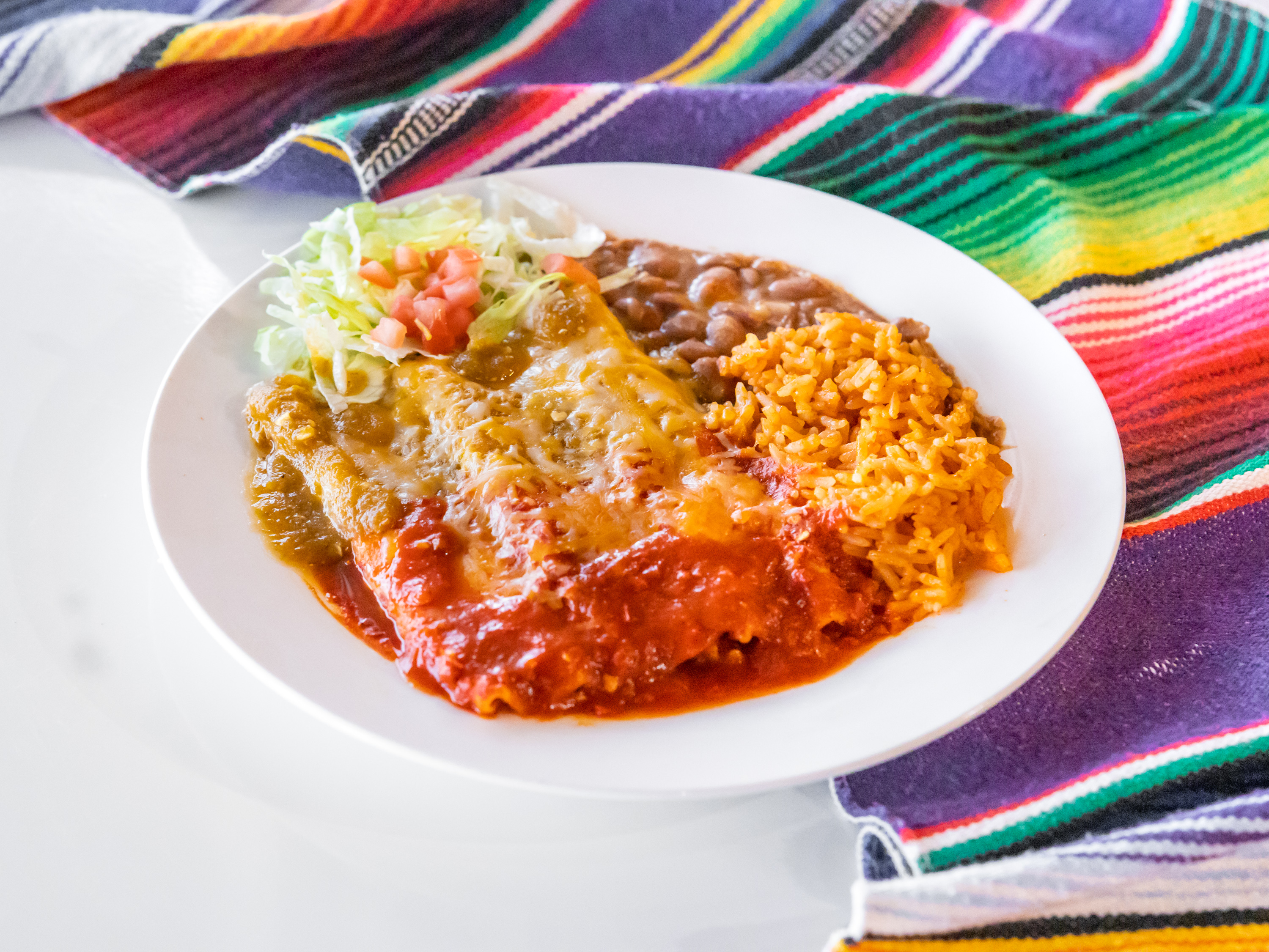 Order Enchiladas Plate food online from El Mariachi Authentic Mexican Food store, Cedar Crest on bringmethat.com