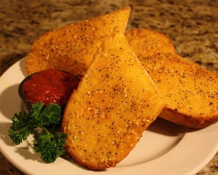 Order Garlic Bread - Appetizer food online from Straw Hat Pizza store, Rancho Cordova on bringmethat.com