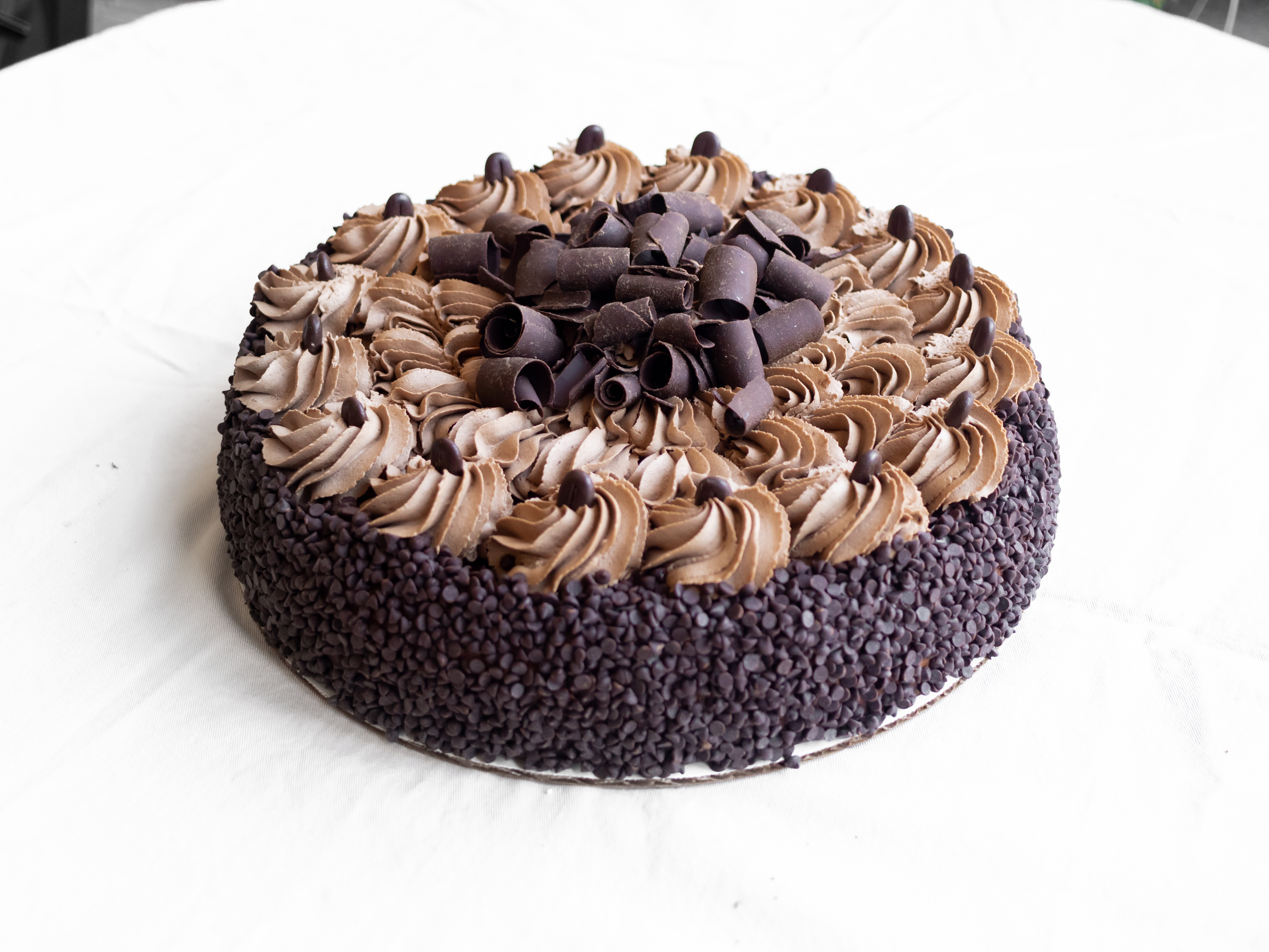 Order Mocha Chocolate Chip Cheesecake food online from Slices Fabulous Cakes store, Cleveland on bringmethat.com