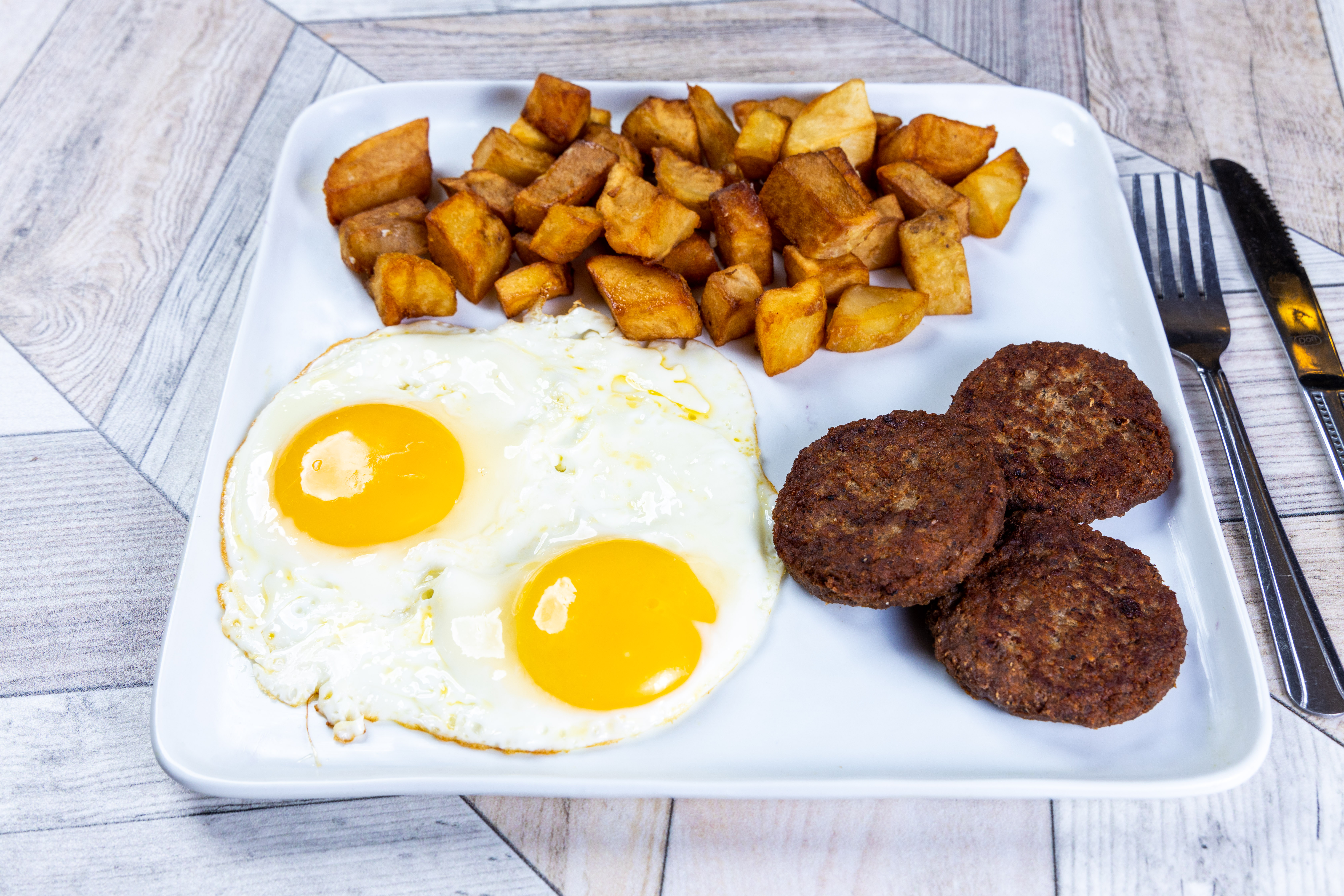 Order Extra Large Eggs Any Style with Turkey Patties food online from Top View Restaurant store, Chicago on bringmethat.com