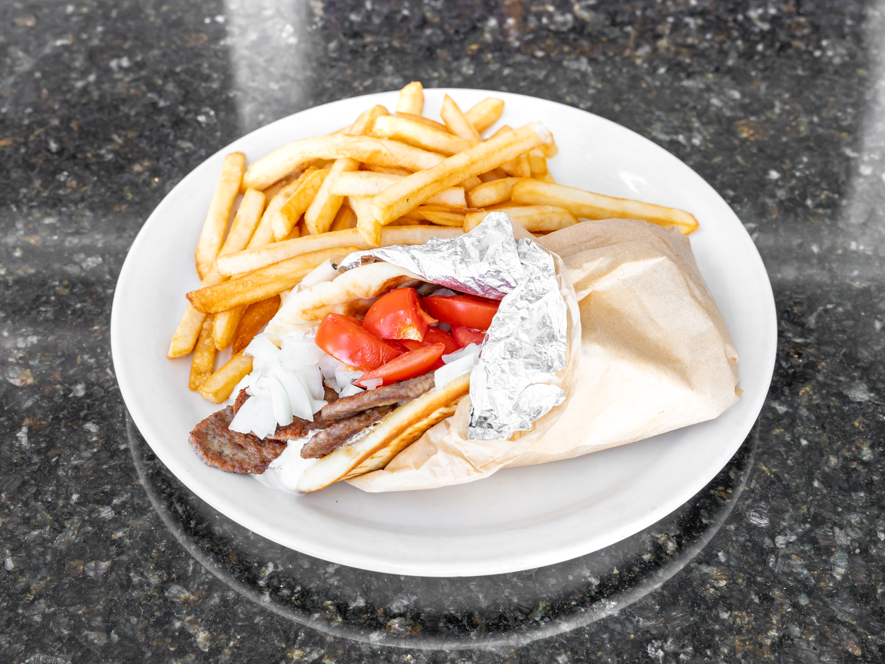 Order Beef Gyro Wrapped Pita food online from Uncle Pete Cafe store, Westminster on bringmethat.com