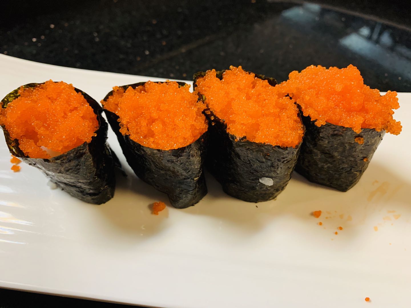 Order 2 Pieces Smelt Egg Sushi food online from Super Sushi store, Las Vegas on bringmethat.com