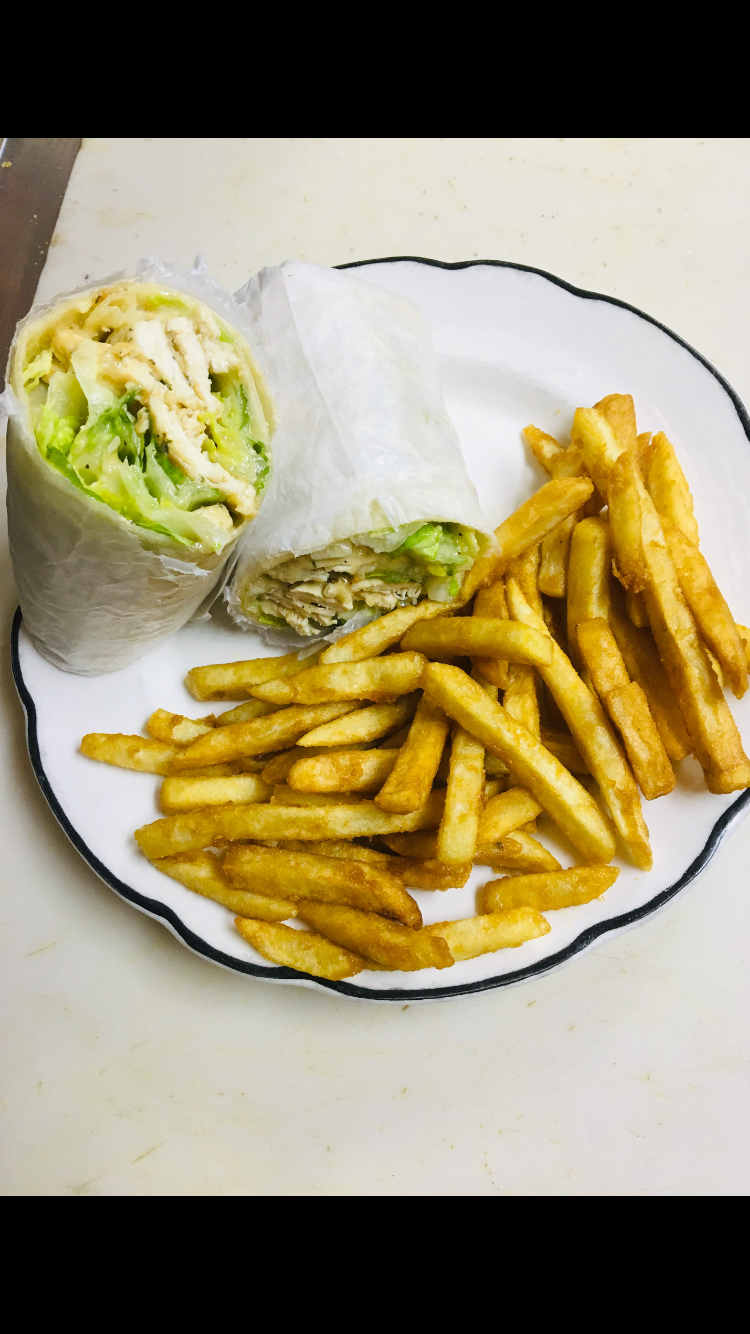 Order Grilled Chicken Caesar Salad Wrap w French fries  food online from Fontana Restaurant store, Bayonne on bringmethat.com