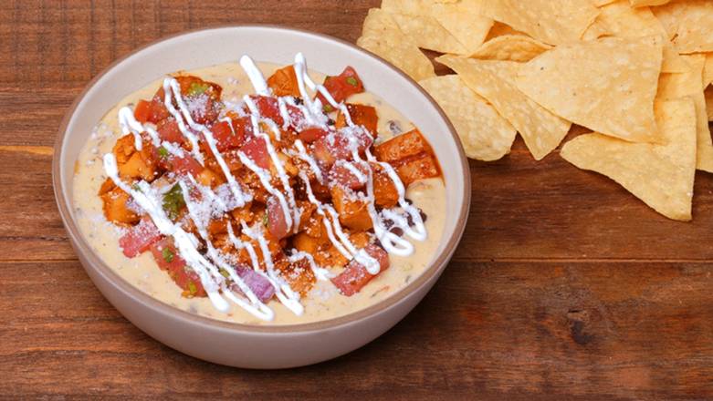 Order Hot-Bling Honey Chicken Loaded Queso food online from Pure Gold by Qdoba store, Gambrills on bringmethat.com