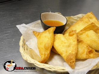 Order 103. Crab Rangoon food online from China Express store, Chicago on bringmethat.com