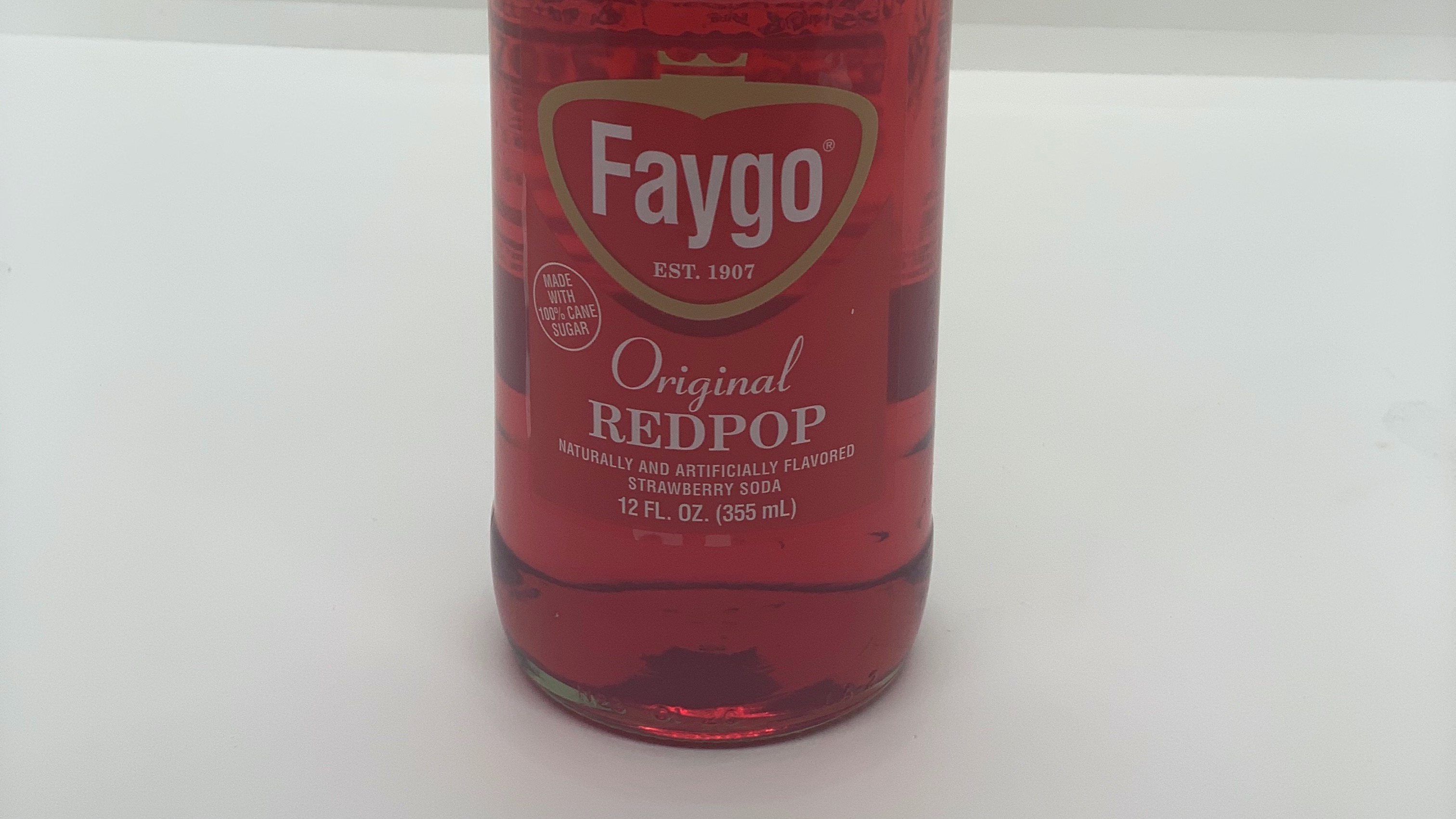Order Faygo red pop food online from Dtown Pizzeria store, Los Angeles on bringmethat.com