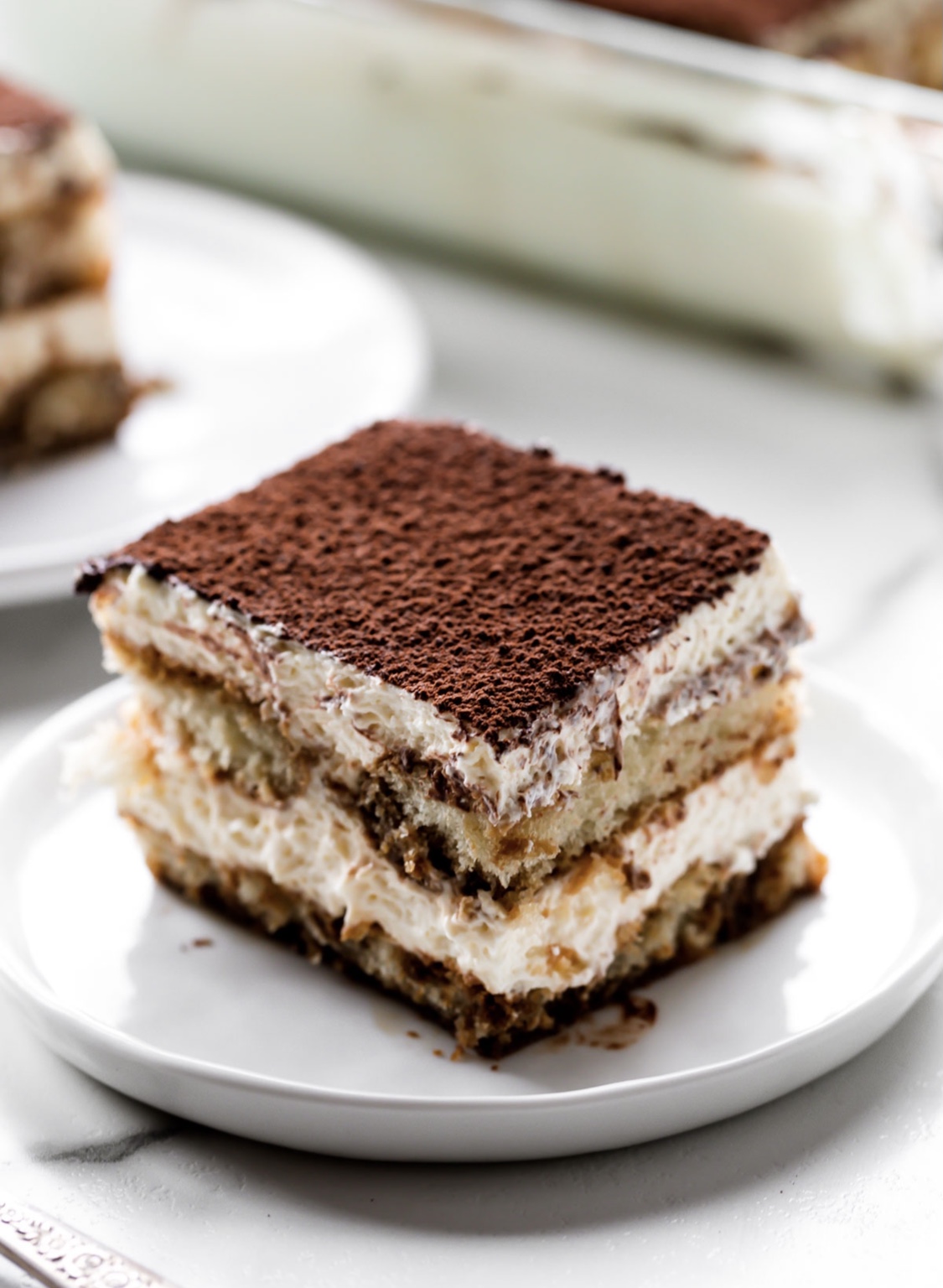 Order Tiramisu Cake ☕️  food online from Sweet Scape Desserts store, New York on bringmethat.com