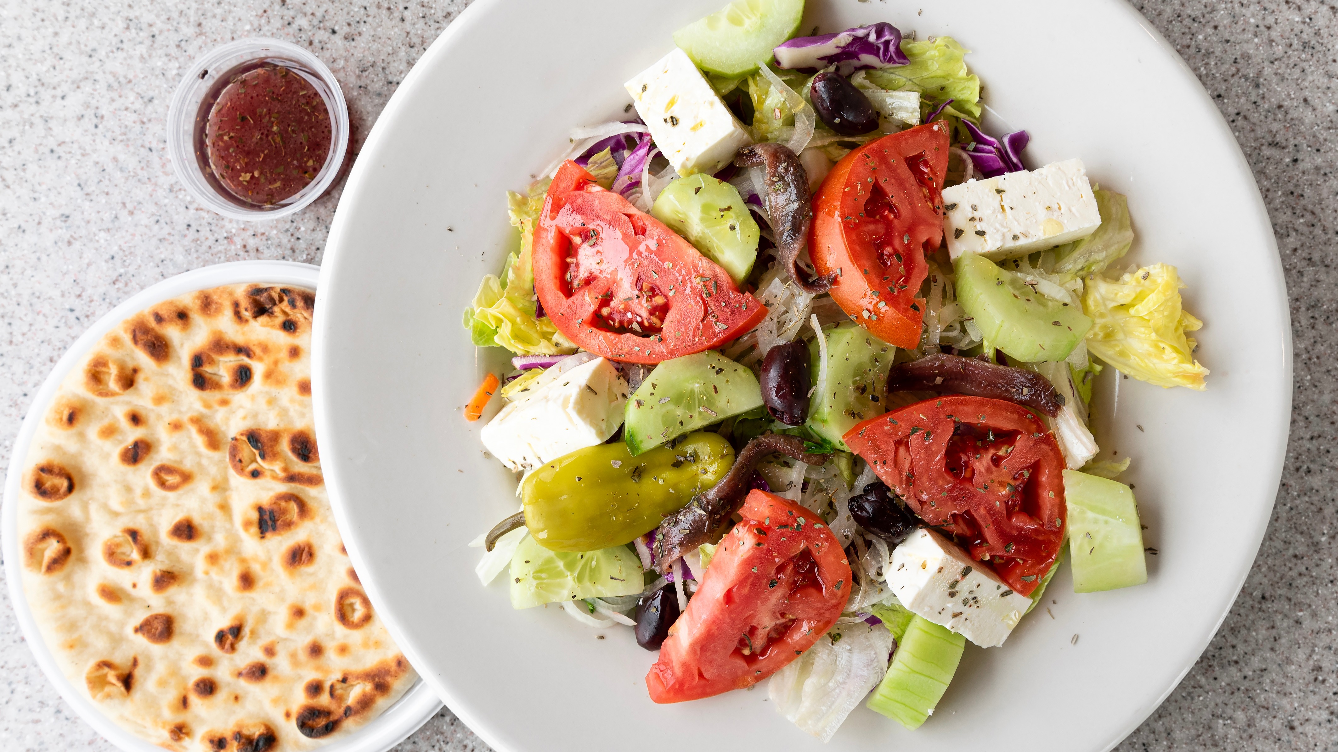 Order Greek Salad food online from Hub's store, Chicago on bringmethat.com
