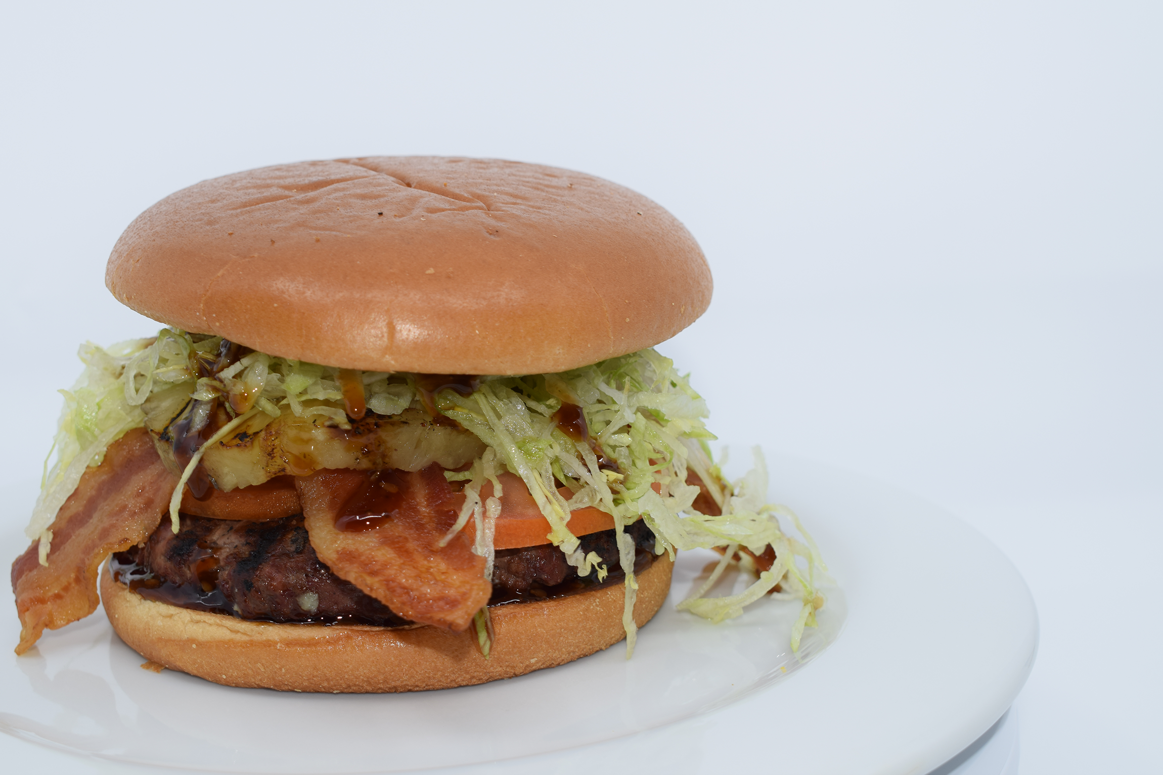 Order THE TERIYAKI BURGER food online from Mad House Comedy Club store, San Diego on bringmethat.com