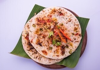 Order Uthappam food online from Peacock Indian Cuisine store, Plano on bringmethat.com