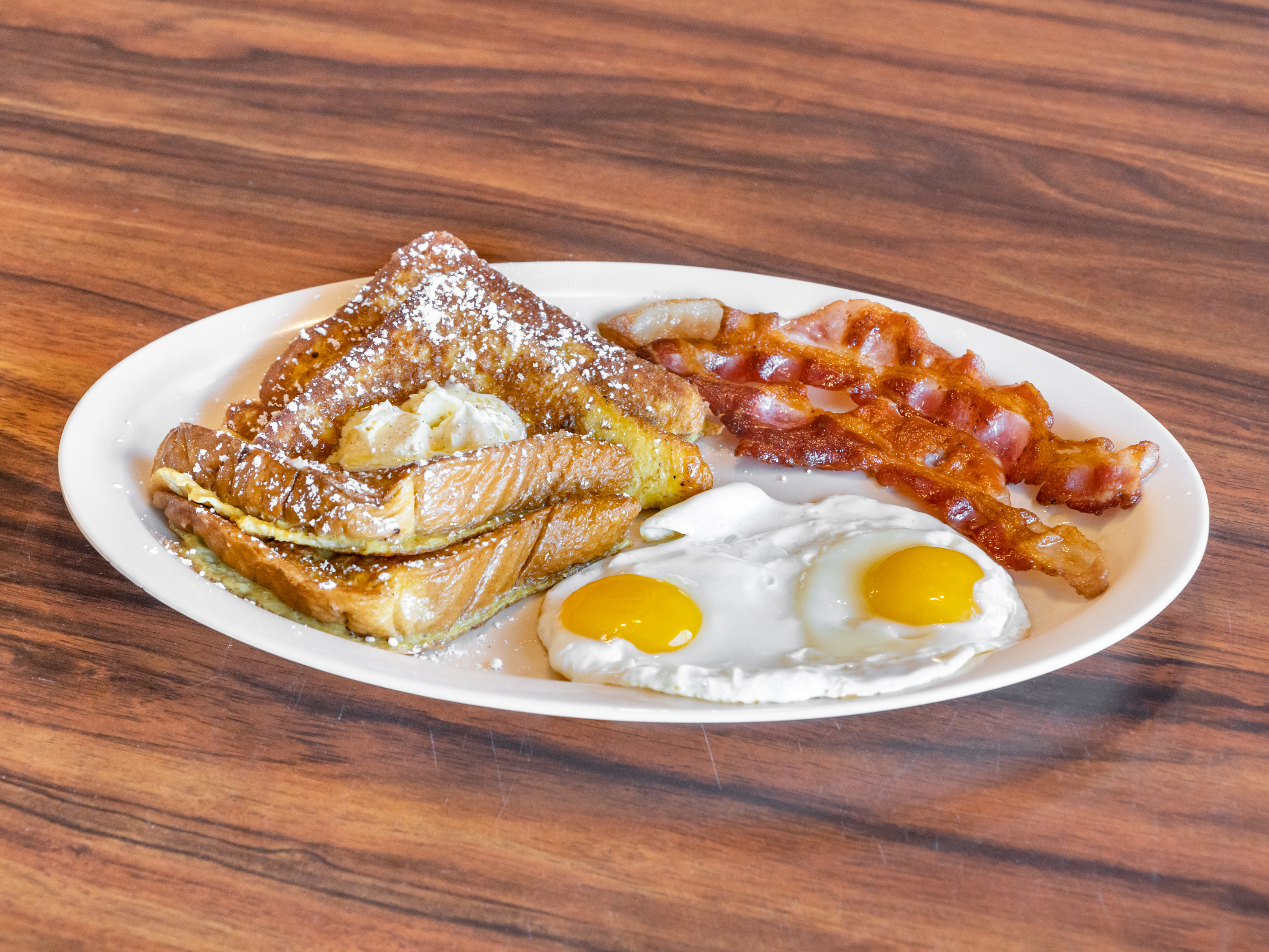 Order 5. French Toast, 2 Bacon, 2 Eggs Breakfast food online from Golden Burger store, Long Beach on bringmethat.com
