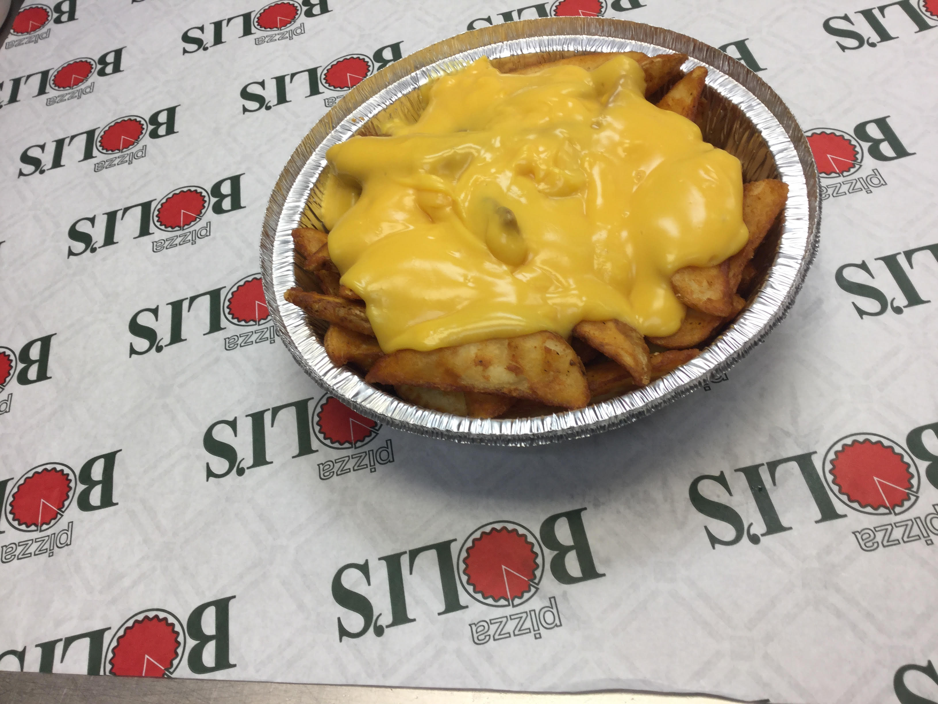 Order Western Fries with Cheddar Cheese Sauce food online from Pizza Bolis store, Manassas on bringmethat.com