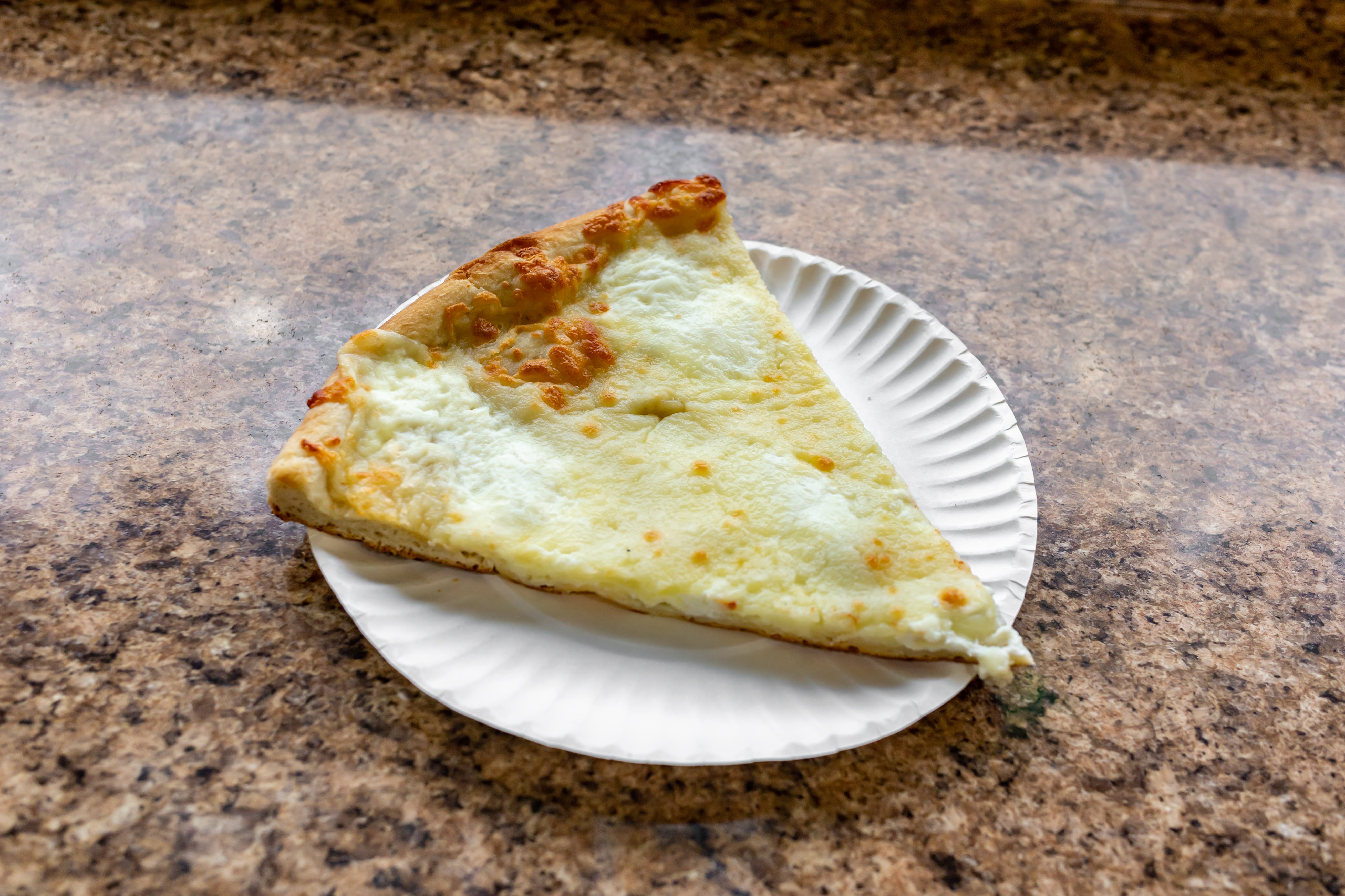 Order White Pizza - Large food online from Lorenzo's Pizza store, St James on bringmethat.com
