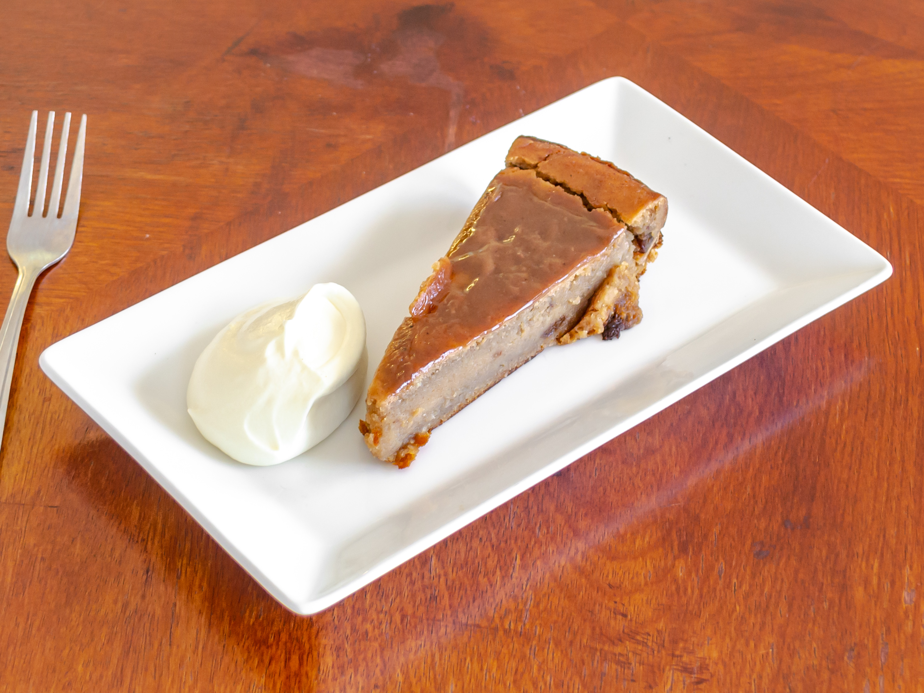 Order Jamaican Style Sweet Potato Pudding food online from Dainty Kitchen store, Colorado Springs on bringmethat.com