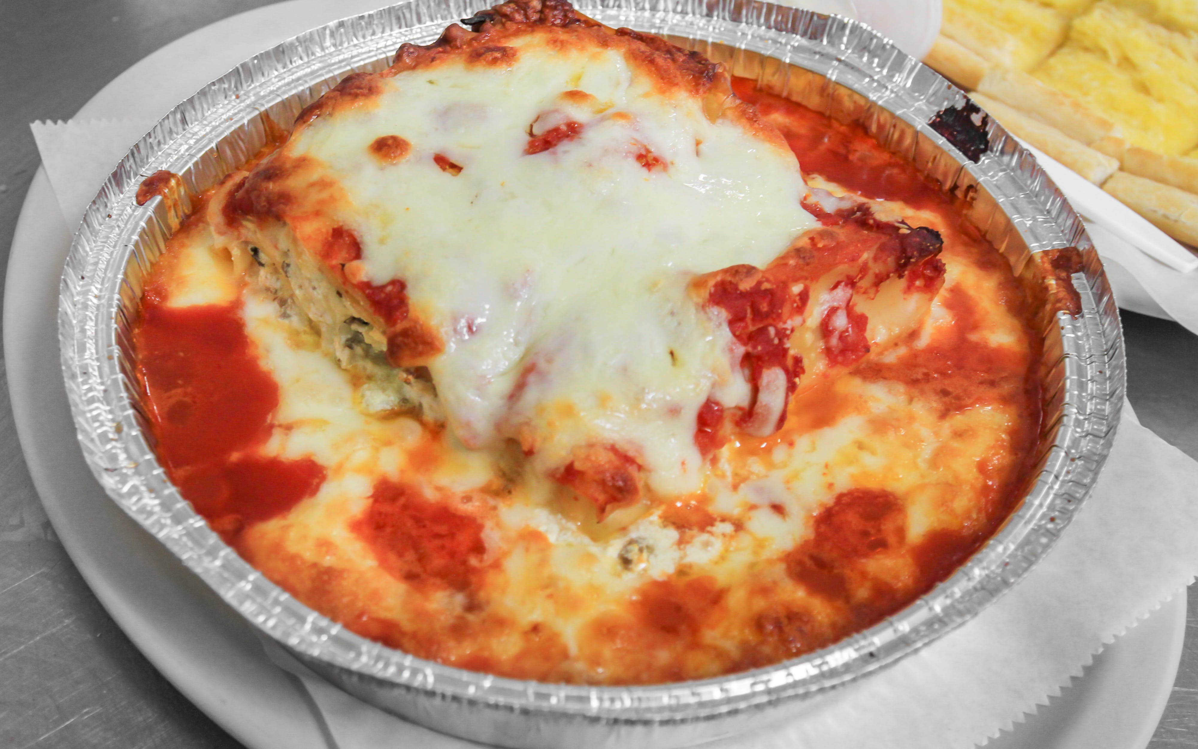 Order Baked Lasagna food online from Vini's Pizza store, Chicago on bringmethat.com